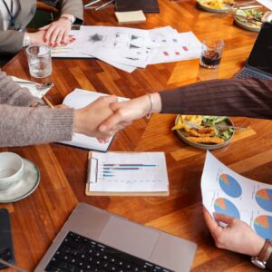 An office consultation between an EAP coordinator and a third-party administrator discussing DOT fleet compliance.